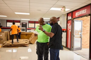 Kern Halls, founder of Ingenious Culinary Concepts, conducting and planning a school cafeteria design and remodel.